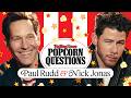 Paul Rudd & Nick Jonas Answer Popcorn Questions: Reality TV, Karaoke, Impressions & More