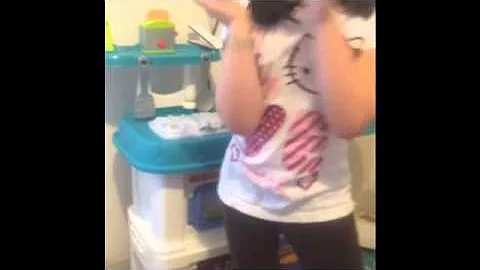 Kaitlyn cooking bacon