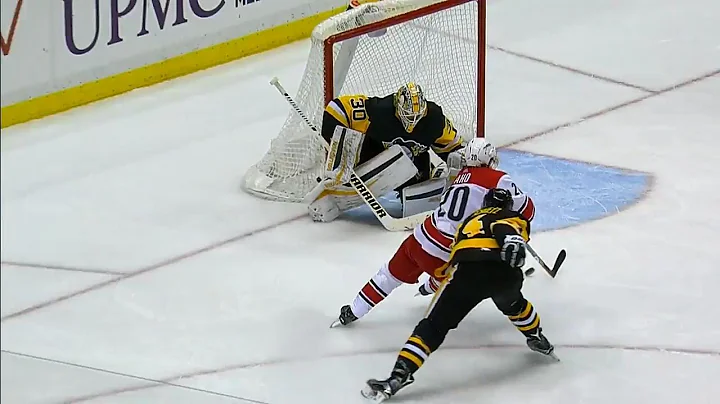 Hurricanes' Aho walks around Schultz and beats Mur...
