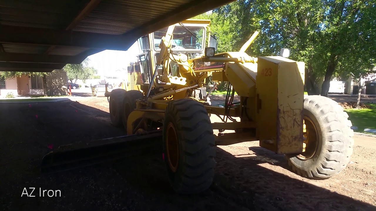  CAT  140H Grading Under Carport  YouTube