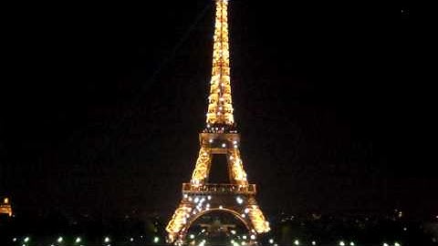 The Eiffel tower lights up