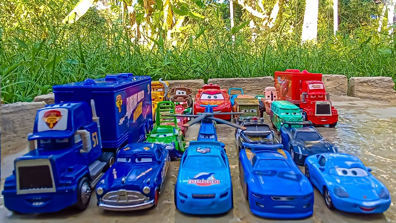 Disney Pixar Cars Various Cars Miniature Cars Roll Down A Colorful disney-pixar-cars-various-cars-miniature-cars-roll-down-a-colorful