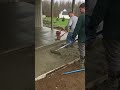Pouring concrete with a power screed