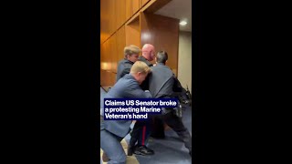 Claims US Senator broke a protesting Marine Veterans hand