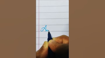 Anmol in cursive writing✍️#cursivewriting #handwriting