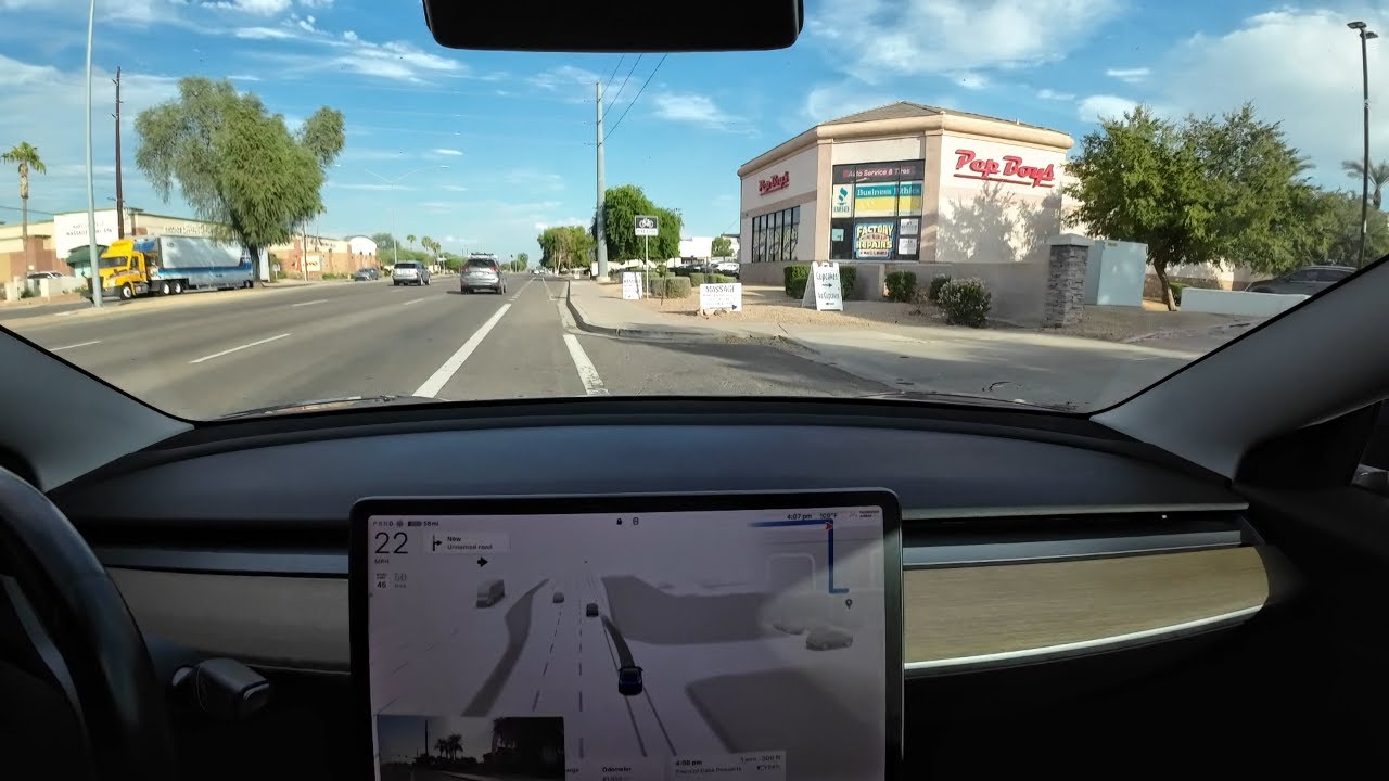 Tesla FSD 12.5.4.1 turns left prematurely; nearly runs into curb.