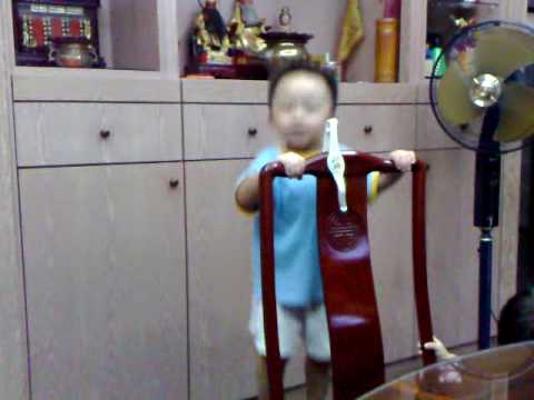 090531 03a Jaren using toy tong as mic