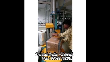 SEMI-AUTOMATIC CARTON BOX STRETCH WRAPPING MACHINE WITH TOP PNEUMATIC HOLDER.