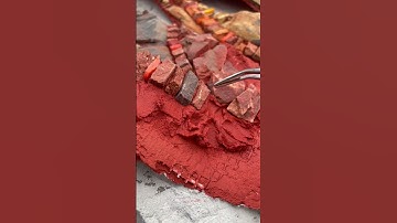 Working on a mosaic: setting pieces of stone and glass into thinset. #shorts #satisfying #mosaicart