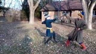 Sabre fencing sparring, various techniques.