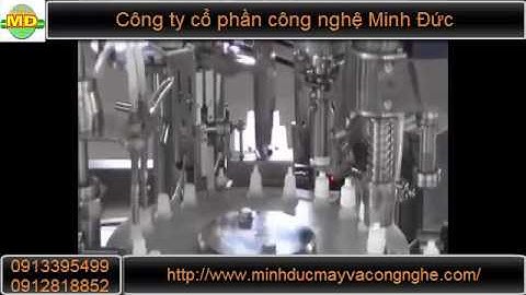 Máy chiết rót vặn nắp chai dung dịch chính xác Minh Đức