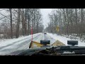 oil truck passing at no passing sign in snowstorm