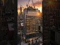 Fully completed modern skyscraper dominating the city skyline, flawless reflective glass facade