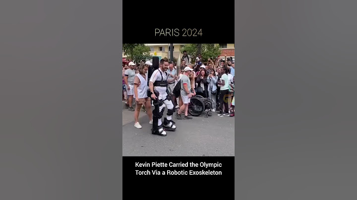 Kevin Piette Carried the Olympic Torch Via a Robotic Exoskeleton #paris2024 #Olympics  #kevinpiette