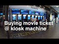 Buying movie tickets using kiosk at GSC Cinema in Mid Valley Megamall
