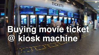 Buying movie tickets using kiosk at GSC Cinema in Mid Valley Megamall