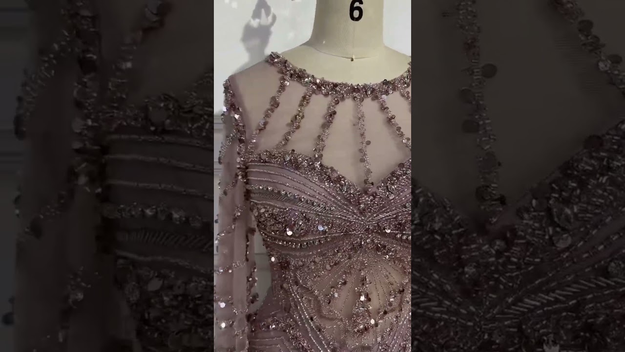 Make a statement in sophistication with this timeless and alluring evening dress.