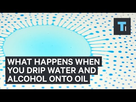 This is what happens when you drip water and alcohol onto oil