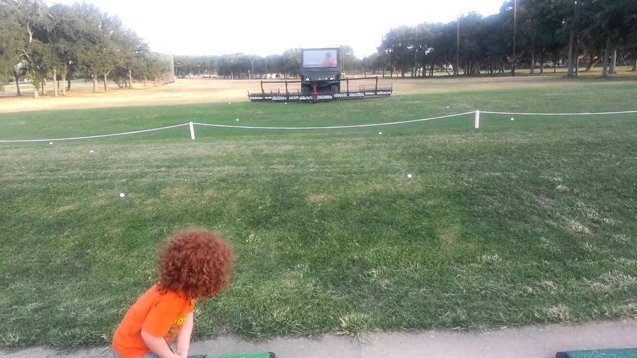 3 year old golfer hits the tractor YouTube