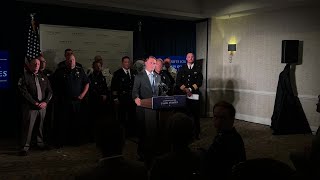Virginia Attorney General Jason Miyares answers a question about campaigning alongside other members