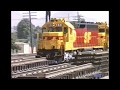 Colton Crossing 1986 incl. UP train w/ Farmer John "hog block" Class S-40-16 stock cars