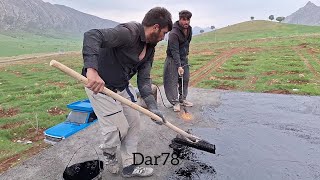 Hamidreza and brothers: Applying a bitumen layer on the roof and ceramic floor