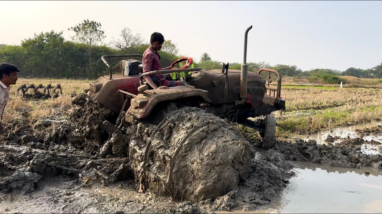 Tracktor Stick Solis tractor stuck in mud pulling out by Mahindra tractor | tractor ...