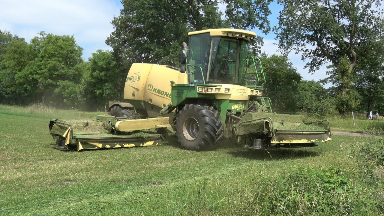 Maaien met Krone BigM II en New Holland TS110a met Kuhn FC 243 Lift Control (2018)