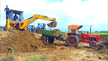 New Jcb 3dx Backhoe Loader Machine Loading Red Mud In Mahindra 475 DI Tractor | Jcb Video