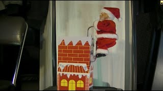 Santa Claus climbing the chimney