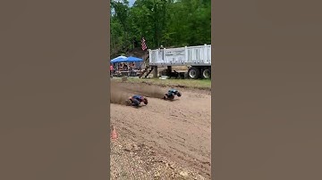 Traxxas Xmaxx vs Xmaxx in a RC mud bog drag race