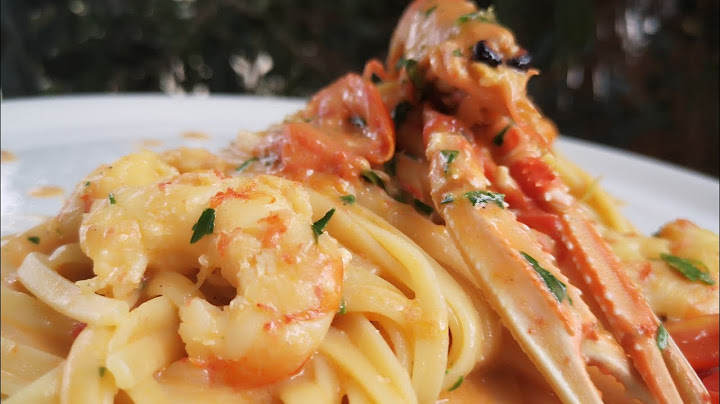 Linguine agli scampi e gamberoni con cremina di rucola