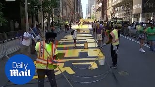 Timelapse captures 'Black Lives' Matter' mural written outside Trump Tower in New York