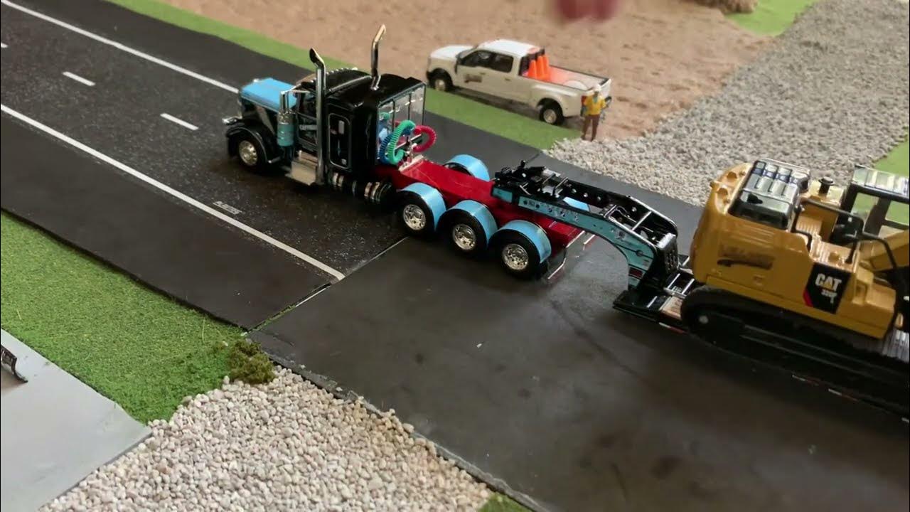 1/64 scale construction equipment gets moved to the new construction