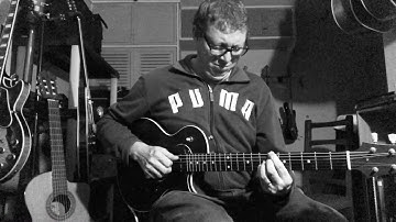 Somewhere over the rainbow. Carlos Delgado, solo guitar.