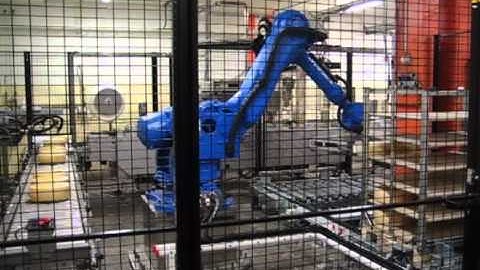 Motoman robots in cheese handling application