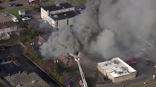 Strip mall burns in Trenton