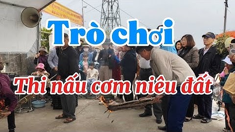 Thi nấu cơm niêu đất tại lễ hội chùa Long Châu Cổ Tự.