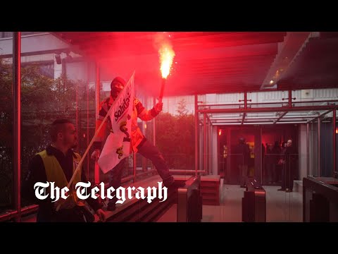 French protesters storm Louis Vuitton HQ in Paris