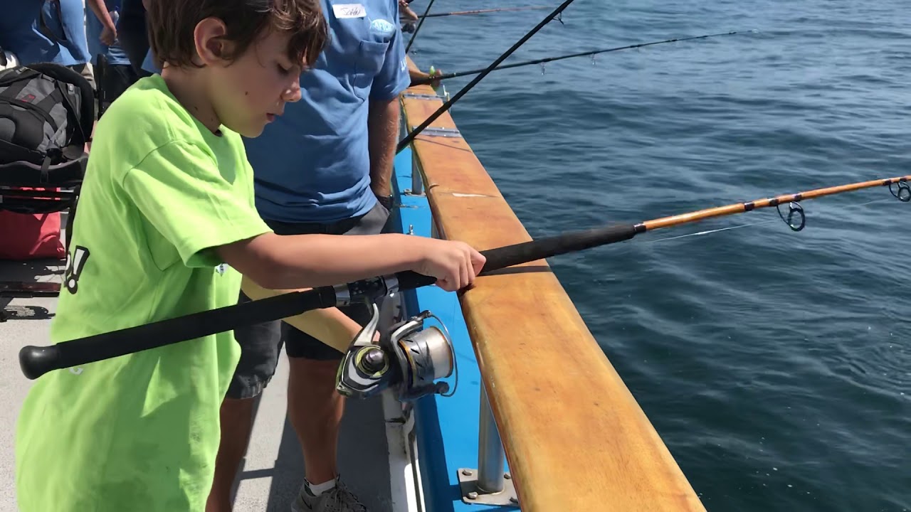 Jack at Fish for life catching a fish! YouTube