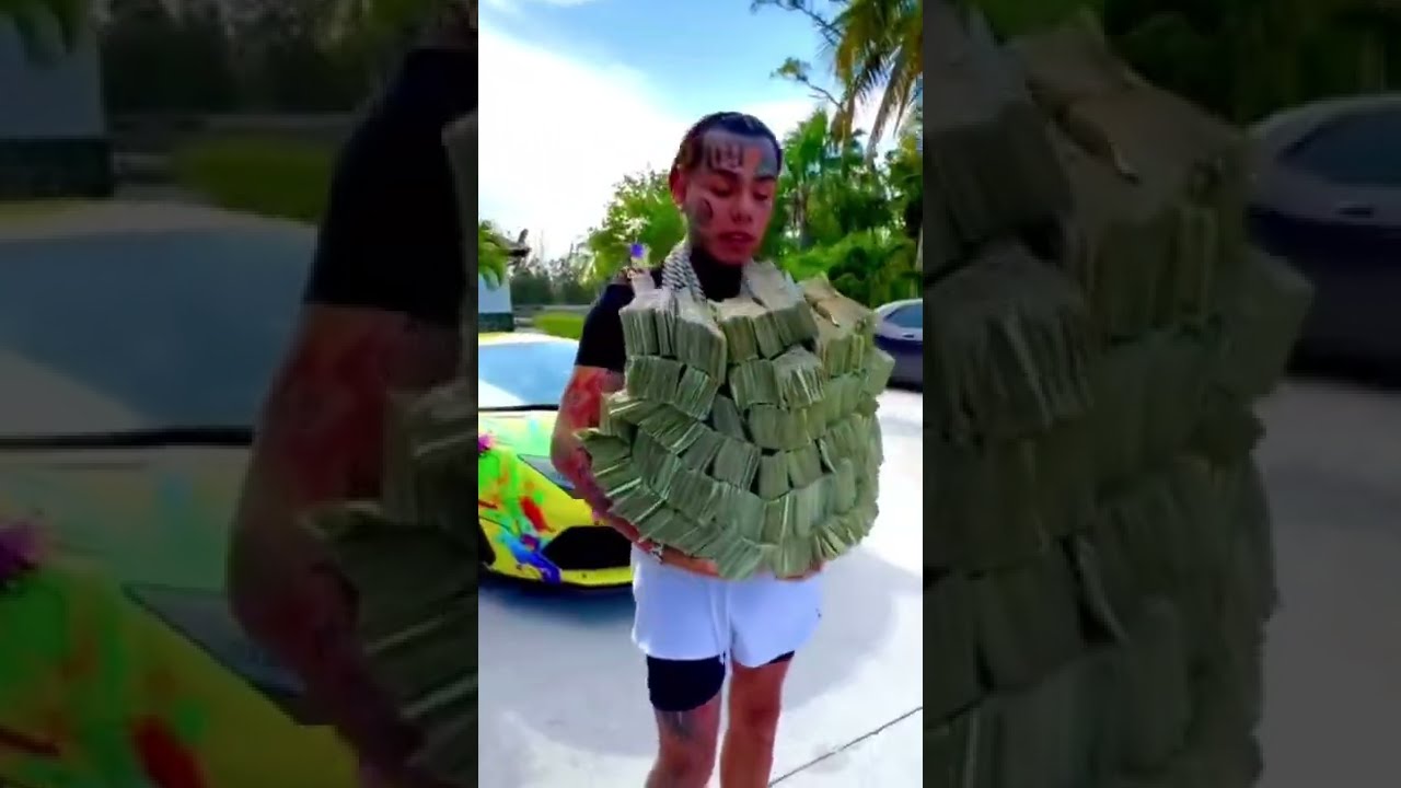 6ix9ine Flexing His Money Shorts