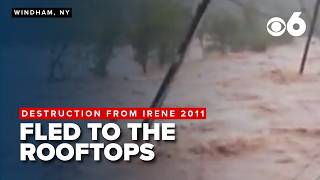 Couple forced to the roof as floodwaters rush through their home