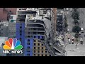 Crane implosion at Hard Rock Hotel collapse site in New ...