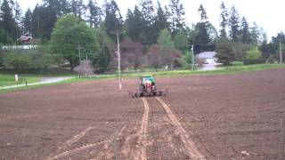 Farmer Cathy and Farmer Josh plant the pumpkin seeds