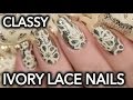 Classy ivory lace nail art over chrome flakie base