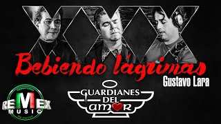 Video thumbnail of "Bebiendo lágrimas - Guardianes del amor - Gustavo Lara - En Vivo (Video Oficial)"