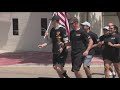 Torch runners carry flame for the Special Olympics Idaho State Summer Games