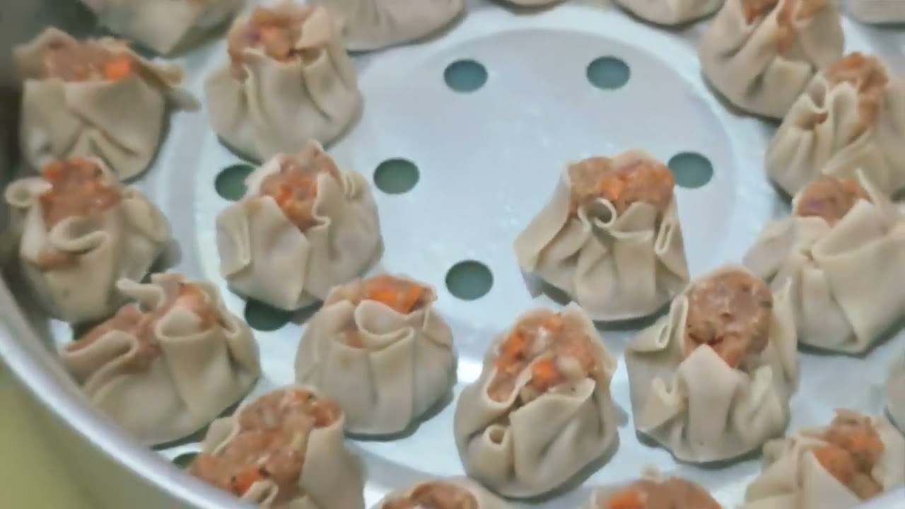 To make beef siomai, mix ground beef with, soy sauce, sesame oil, and seasonings 