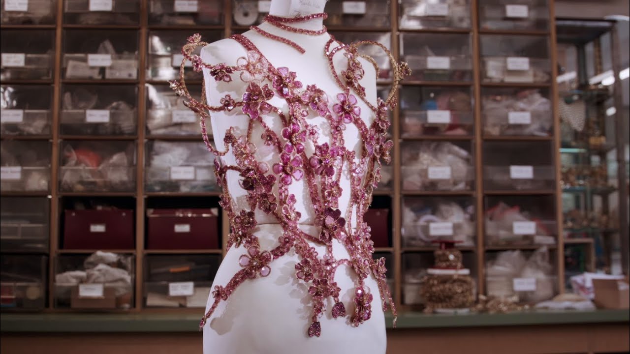 swarovski dress design A wedding dress by Manal Ajjaj, meticulously crafted with shimmering  Swarovski crystals and luxurious French tulle. The design features a  refined silhouette that enhances the body's elegance and defines its shape  with