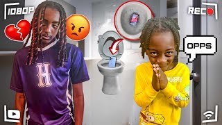 PHONE IN TOILET PRANK!!